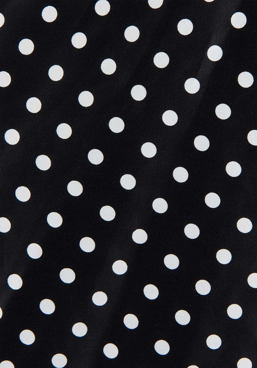 Kellohame mustalla polka dot -kuviolla, lähikuva
